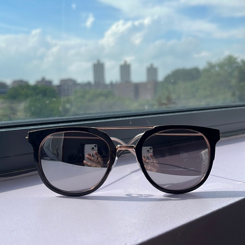 Reflective sunglasses.